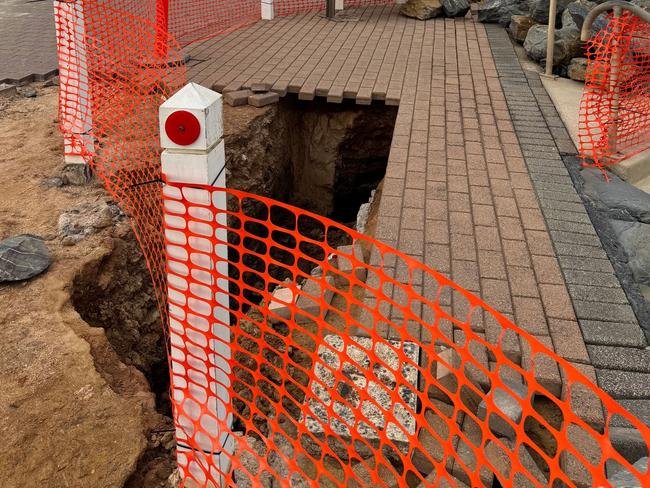 On Thursday night, the City of Holdfast Bay said the council's engineering team was investigating the extent of damage with a large section currently fenced off. Picture: City of Holdfast Bay