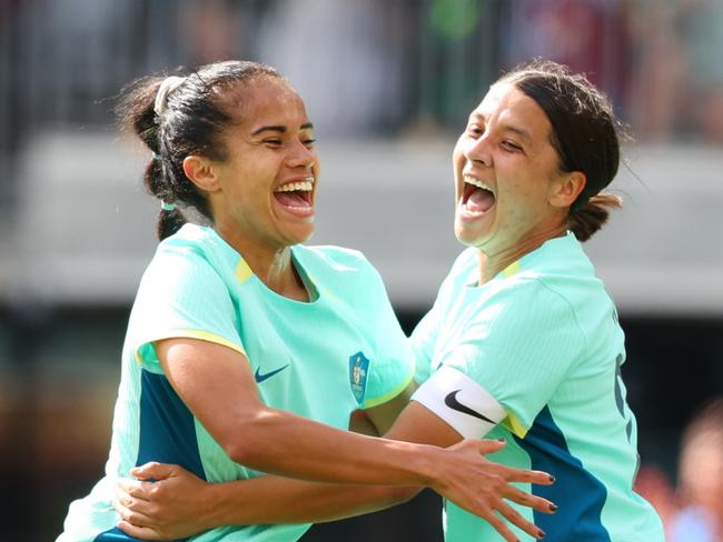 PERTH, AUSTRALIA - OCTOBER 29: Mary Fowler of the Matildas and Sam Kerr of the Matildas celebrate a goal during the AFC Women's Asian Olympic Qualifier match between Philippines and Australia Matildas at Optus Stadium on October 29, 2023 in Perth, Australia. (Photo by James Worsfold/Getty Images)