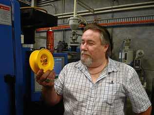 REEL GOOD: General manager of Total Plastics Solutions Pascal Trojman with a Alvey fishing reel that his company has been helping to produce. Picture: John McCutcheon