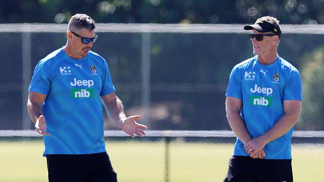 Damien Hardwick, right, chats with assistant coach Adam Kingsley at Tigers training. Picture: Michael Klein