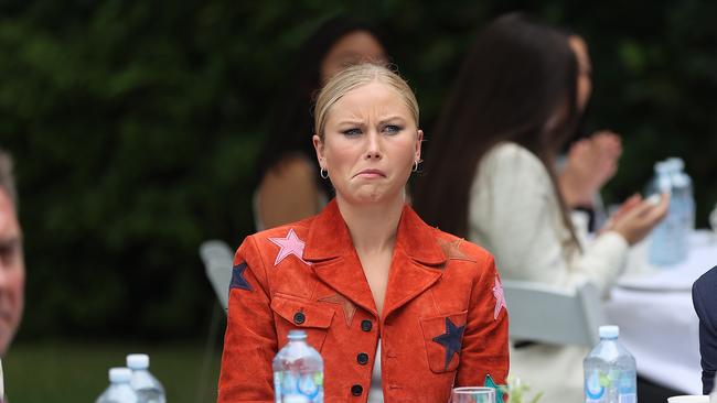 As Scott Morrison addressed the crowd Grace Tame did not look impressed. Picture: NCA NewsWire / Gary Ramage