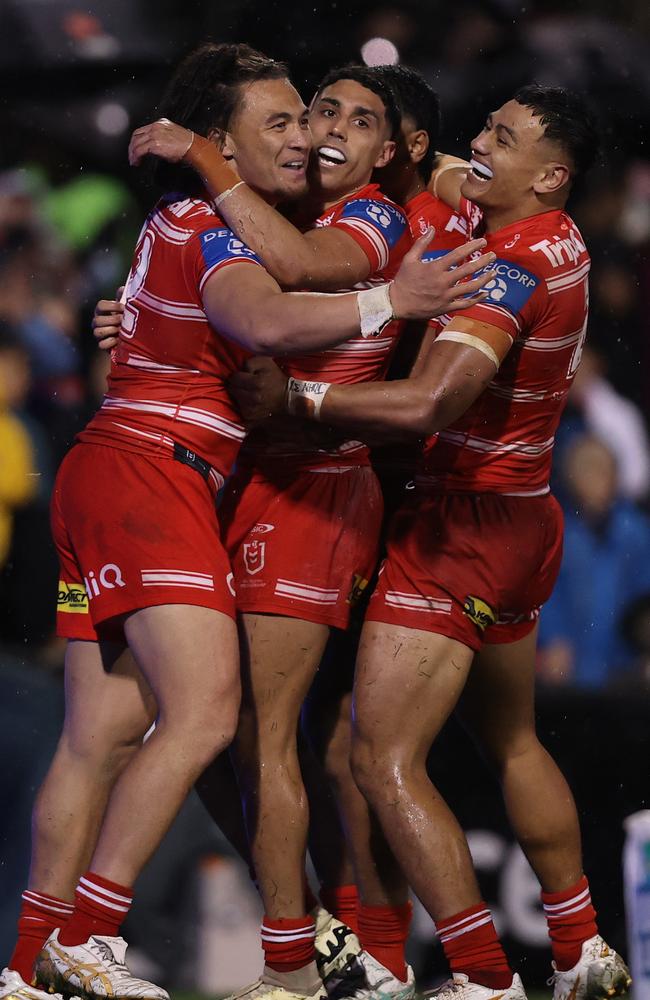 Tyrell Sloan of the Dragons celebrates scoring a try during the round 13 NRL match between Penrith Panthers and St George Illawarra Dragons at BlueBet Stadium on June 01, 2024 in Penrith, Australia. (Photo by Jason McCawley/Getty Images)