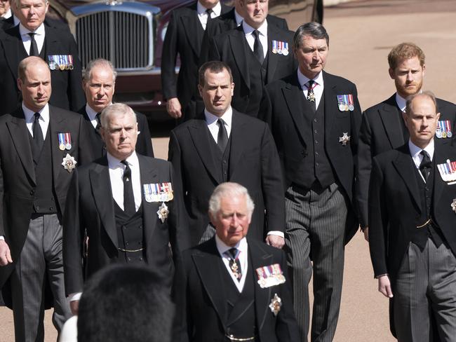 William (far lef) and Harry (far right) walked behind their grandfather’s coffin with other members of the royal family. Picture: Getty Images