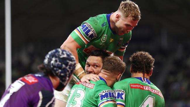 MELBOURNE, AUSTRALIA - JULY 17: The Raiders celebrate after Jordan Rapana (C)of the Raiders scored a try which was later disallowed during the round 18 NRL match between the Melbourne Storm and the Canberra Raiders at AAMI Park, on July 17, 2022, in Melbourne, Australia. (Photo by Mike Owen/Getty Images)