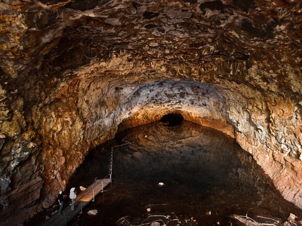 <span>16/50</span><h2>Undara Lava Tubes, QLD</h2><p> Explore the volcanic marvels of Undara and learn about the longest <a href="https://www.undara.com.au/" target="_blank">lava tubes </a>in the world. Located four hours’ drive from Cairns, these tubes are lava flow tunnels that make a perfect night adventure. Inspect the wildlife that lives in the caves or take a helicopter tour to see scars created by lava flows. Read <a href="https://www.escape.com.au/destinations/australia/queensland/away-from-the-reef-and-the-rainforest-north-queensland-has-another-secret-natural-wonder/news-story/f8e806cb30695daf95e92b2fd4f75e4a" target="_blank" rel="noopener">our Undara Volcanic National Park guide</a> before you head out. Picture: Tourism Queensland</p>