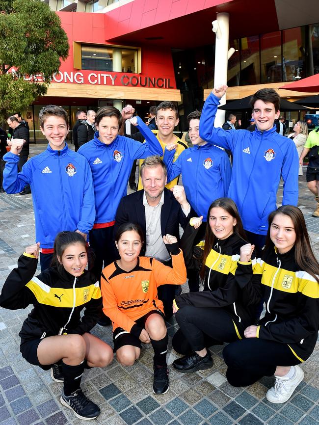 Former Socceroo star and Team 11 ambassador Vince Grella with young local players in Dandenong’s Harmony Square in May last year. Picture: Andrew Batsch