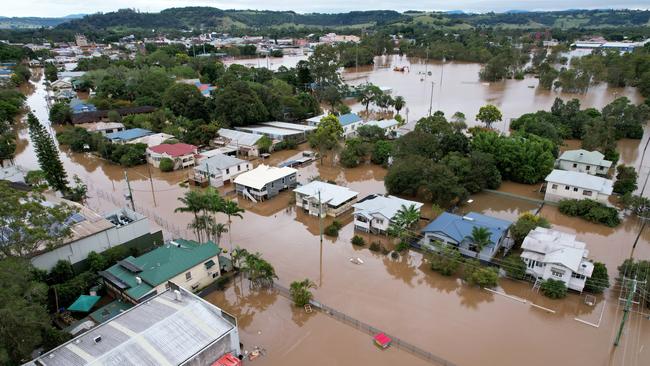 An aerial drone view of houses surrounded by floodwater on March 31, 2022 in Lismore. Picture: Dan Peled/Getty Images