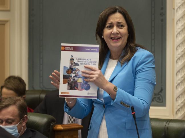 BRISBANE AUSTRALIA - NewsWire Photos SEPTEMBER 2, 2021: Queensland Premier Annastacia Palaszczuk holds up her COVID-19 economic recovery plan during question time at Parliament House. NCA NewsWire / Sarah Marshall