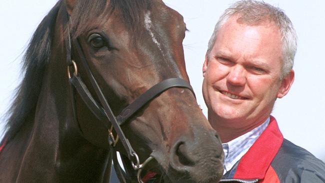 Trainer David Hall spends a quiet moment with Makybe Diva after her 2003 Melbourne Cup win. Picture: Craig Hughes.