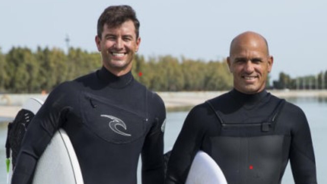 Adam Scott and Kelly Slater have often surfed together.