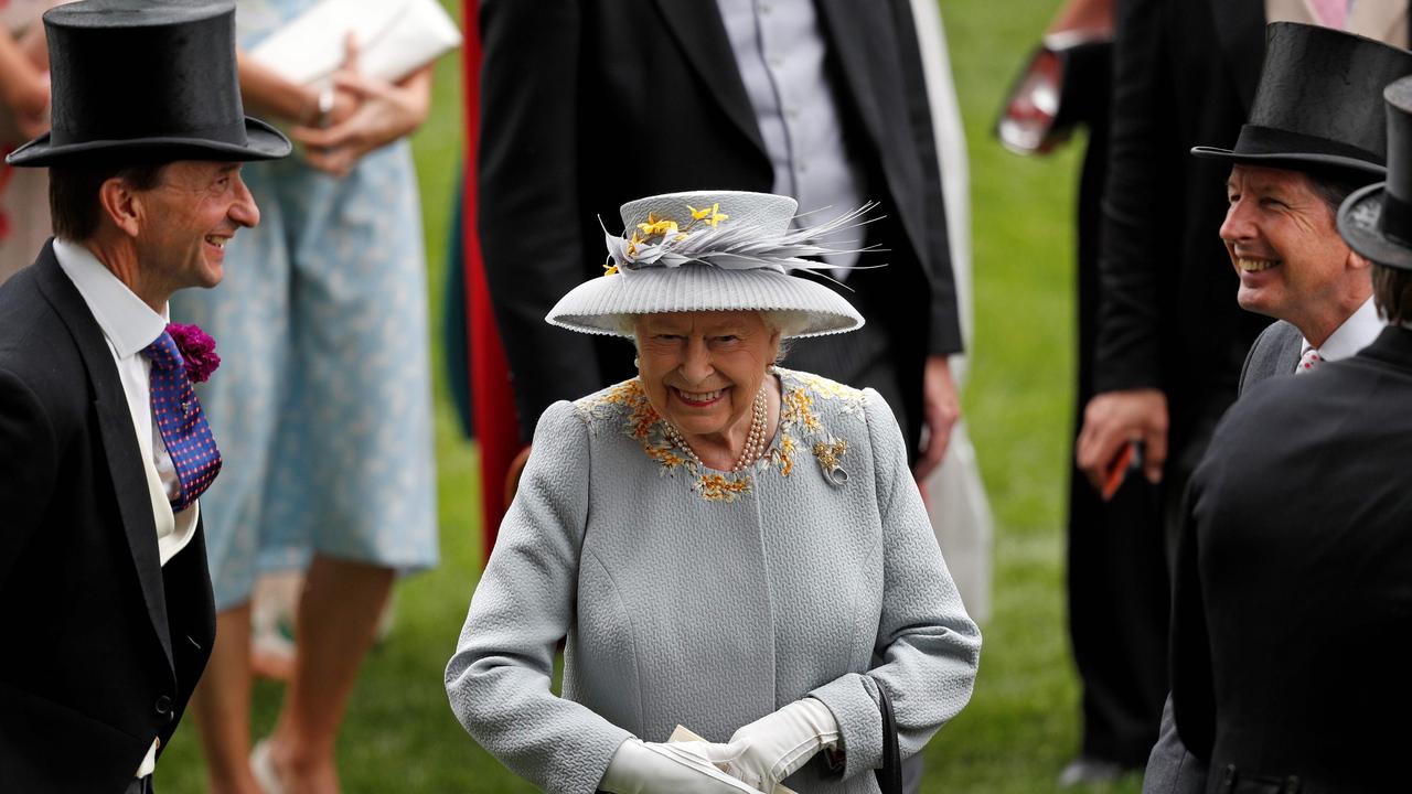 The Queen with CEO of Ascot, Johnny Weatherby (L) and her racing adviser John Warren. Picture: AFP