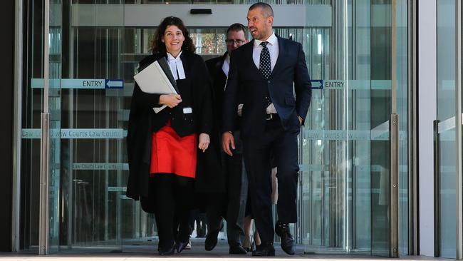 Tolga Kumova and barrister Sue Chrysanthou leave the Federal Court in Sydney on Wednesday. Picture: Gaye Gerard