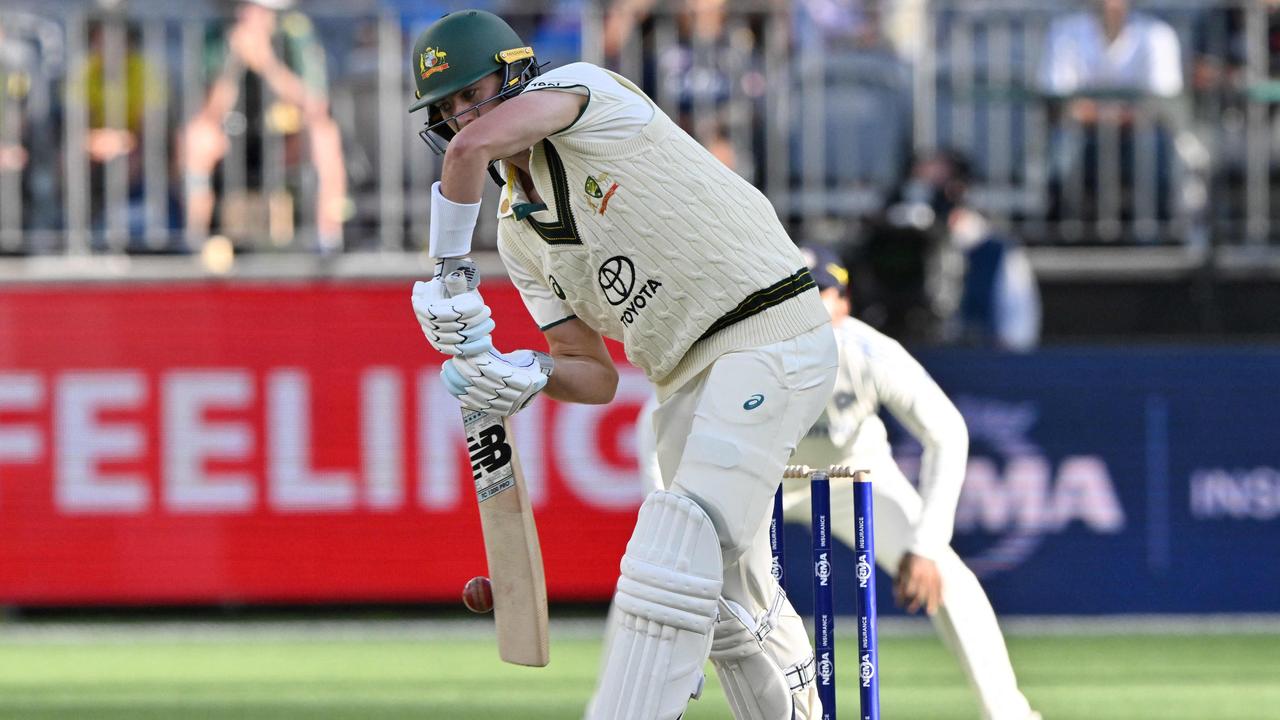 No rescue effort from Pat Cummins this time, edging behind for just 3. (Photo by SAEED KHAN/AFP)