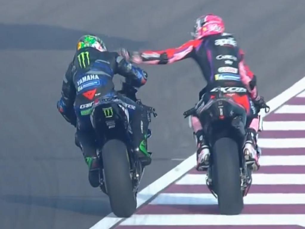 Espargaro slaps his rival in a wild blow-up.