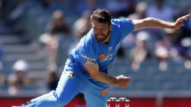 Michael Neser charges in for Adelaide Strikers.