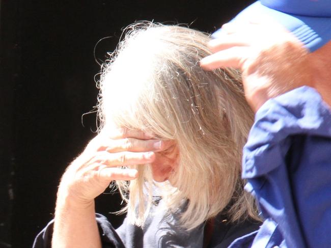 Deborah Lynne Roberts (black shirt, grey hair), 55, appeared in Alice Springs Local Court Tuesday, December 3, 2024 charged with the deaths of 71 cattle at the Arid Zone Research Institute in March, 2023. Picture: Gera Kazakov