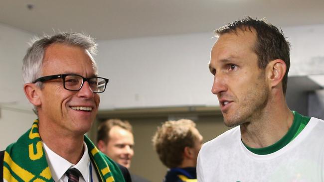 Football Australia CEO David Gallop and Mark Schwarzer in 2013.