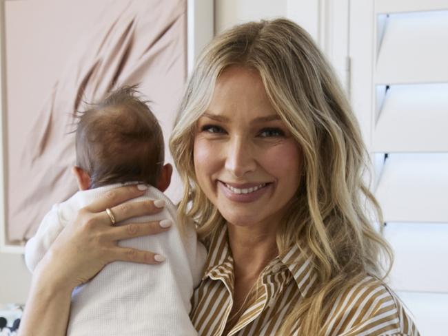 NETWORK ONLY> PLEASE SEE NETWORK PIC DESK FOR USAGE Huggies ambassador Anna Robards with her newborn Ruby at home. She is her second daughter with husband, TV's original Australian Bachelor Tim Robards. The couple have another daughter named Elle. Picture: Supplied