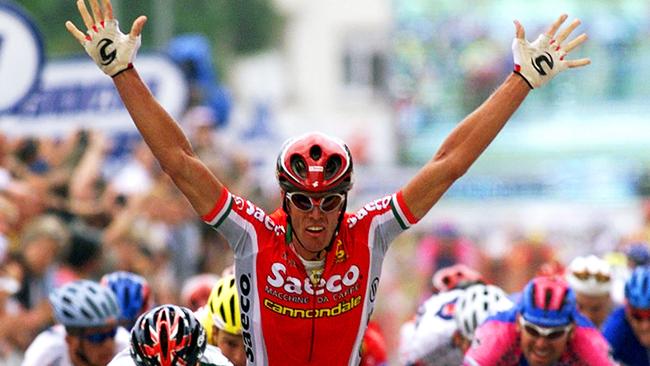 Cycling - Italian cyclist Mario Cipollini crossing line to win seventh stage of Tour de France race. He became the first cyclist to win four successive Tour de France stages.