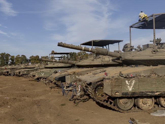 Tanks stand in a gathering point near the border with the Gaza Strip on March 14, 2024 in southern Israel. Picture: Getty Images