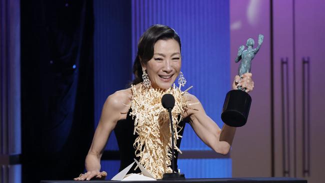 Michelle Yeoh accepts the award for Best Female Actor in a leading role at the 2023 SAG Awards. Photo: Getty