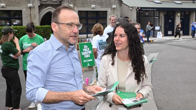 Greens candidate Angelica Di Camillo at the Fawkner Park booth in South Yarra with Greens leader Adam Bandt. Picture: Josie Hayden