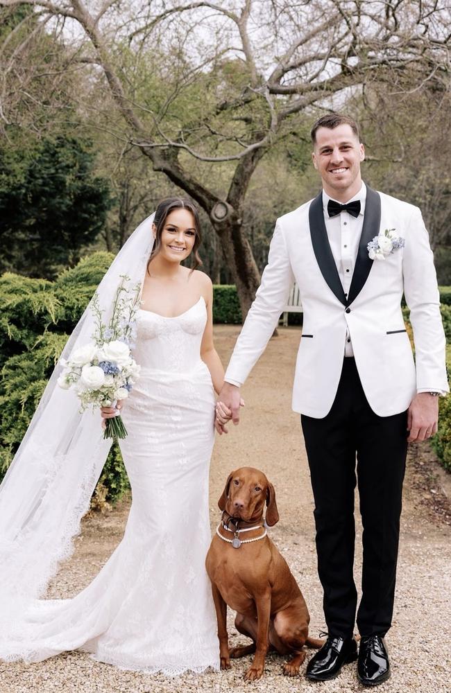 Tristan and Maddison Xerri wed with their dog Hazel by their side. Picture: Kyla Scarborough