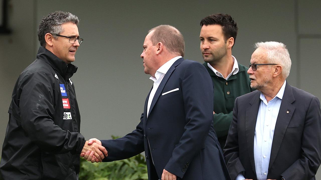 Leon Cameron greets Greater Western Sydney CEO David Matthews, board member Jimmy Bartel and Giants chairman Tony Shepherd on May 12. Picture: Phil Hillyard