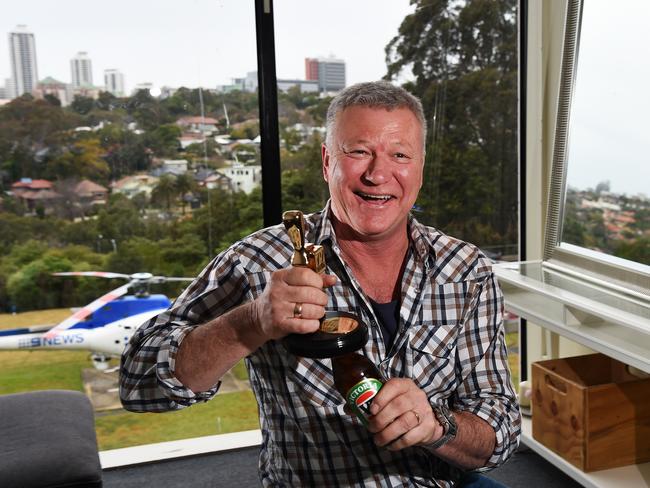 Block host Scott Cam with his Gold Logie-bottle opener.