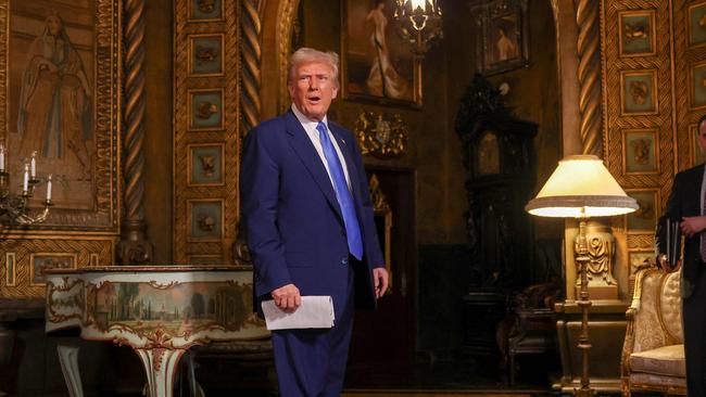 Donald Trump leaves after holding a press conference at his Mar-a-Lago resort. Picture: Getty Images via AFP.