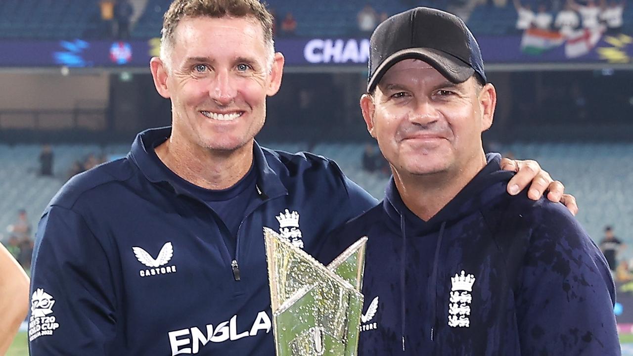 Michael Hussey and Mott with the men's T20 World Cup. Picture: Mark Kolbe/Getty Images