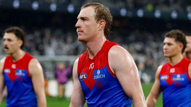 MELBOURNE, AUSTRALIA - MAY 09: Harrison Petty of the Demons looks dejected after a loss during the 2024 AFL Round 09 match between the Carlton Blues and the Melbourne Demons at The Melbourne Cricket Ground on May 09, 2024 in Melbourne, Australia. (Photo by Dylan Burns/AFL Photos via Getty Images)