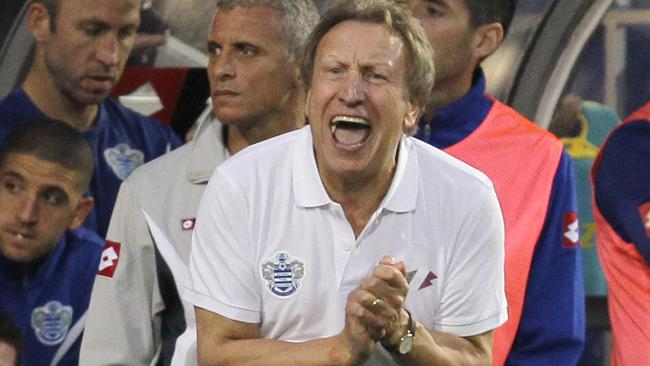 FILE - In this Sunday, Aug. 27, 2014 file photo, Queens Park Rangers' manager Neil Warnock reacts as he watches his team play against Chelsea during their English Premier League soccer match at Loftus Road stadium, London. Neil Warnock has been hired by Crystal Palace for his second spell as the manager of the Premier League club, it was announced on Wednesday, Aug. 27, 2014. (AP Photo/Sang Tan, File)