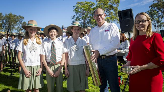 Norco chief executive Michael Hampson and A.B. Paterson College principal Joanne Sheehy with students. Picture: Supplied