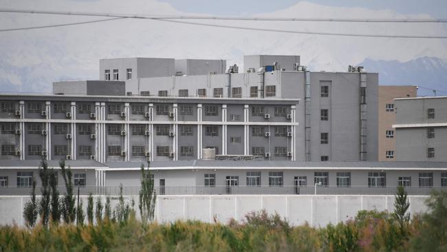 This photo taken on June 4, 2019 shows a facility believed to be a re-education camp where mostly Muslim ethnic minorities are detained, north of Akto in China's northwestern Xinjiang region. (Photo by GREG BAKER / AFP)