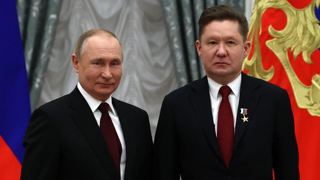 Vladimir Putin and Gazprom CEO Alexei Miller after awarding him with the title of ‘Hero of Labor of the Russian Federation’ during a ceremony at the Kremlin in Moscow this year. Picture: Sergei Karpukhin/Pool/AFP