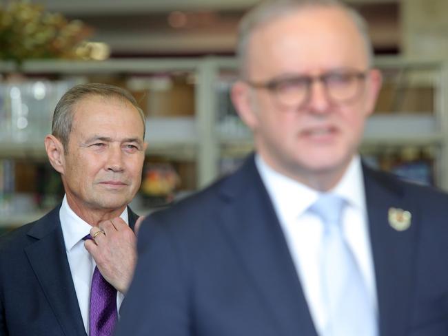 WA Premier Roger Cook stands behind Prime Minister Anthony Albanese. Picture: NewsWire/Philip Gostelow