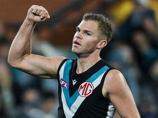 ADELAIDE, AUSTRALIA - AUGUST 03: Dan Houston of the Power  celebrates a goal  during the round 21 AFL match between Port Adelaide Power and Sydney Swans at Adelaide Oval, on August 03, 2024, in Adelaide, Australia. (Photo by Mark Brake/Getty Images)