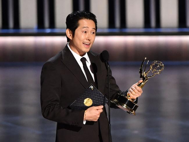 Steven Yeun accepts the award for Outstanding Lead Actor in a Limited or Anthology Series or Movie for Beef. Picture: AFP