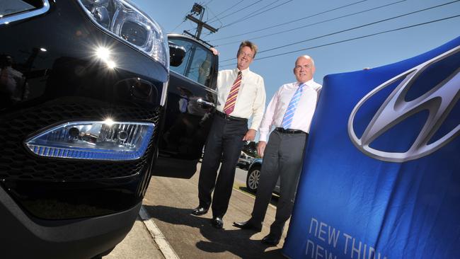 Doug Barton of Bartons car dealership and Terry Mulcahy, regional general manager of Hyundai, at the Bartons dealership in Wynnum.