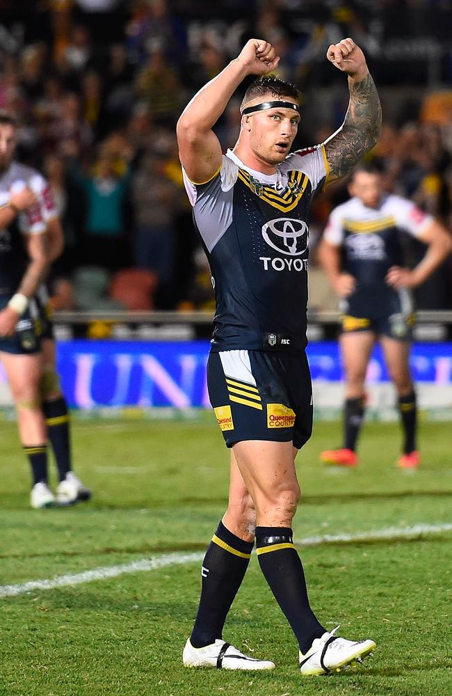 Tariq Sims of the Cowboys celebrates.