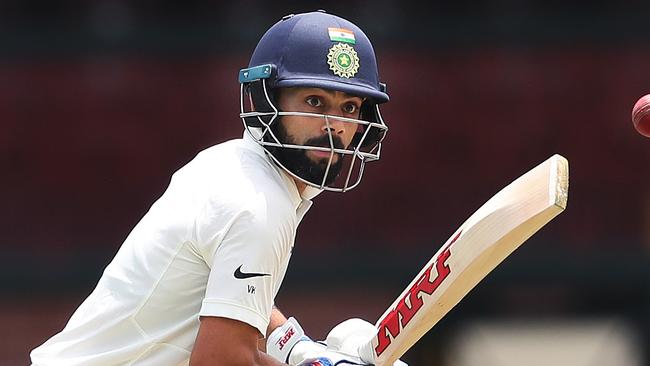 India's Virat Kohli cuts during India v CAXI tour match at the SCG. Picture. Phil Hillyard