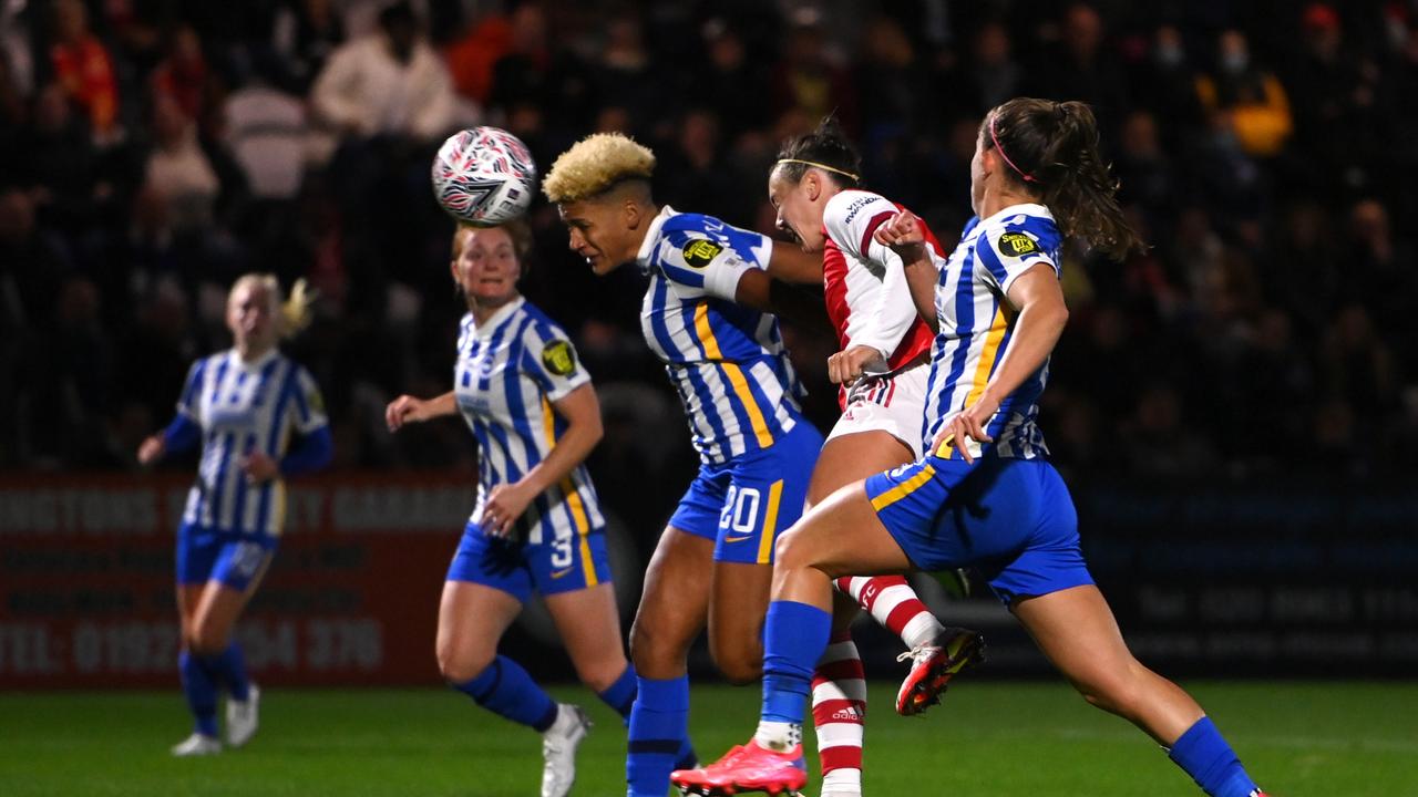 Arsenal attacker Caitlin Foord heads wide while under pressure from Brighton players in the FA Cup semi-final. Picture: Mike Hewitt/Getty Images