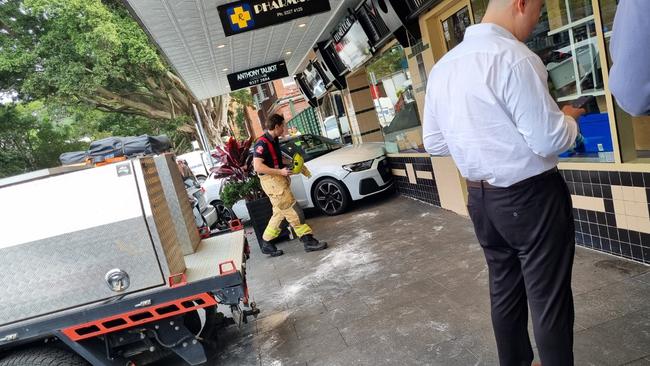 The car smashed into the pharmacy on Plumer Rd on Tuesday.