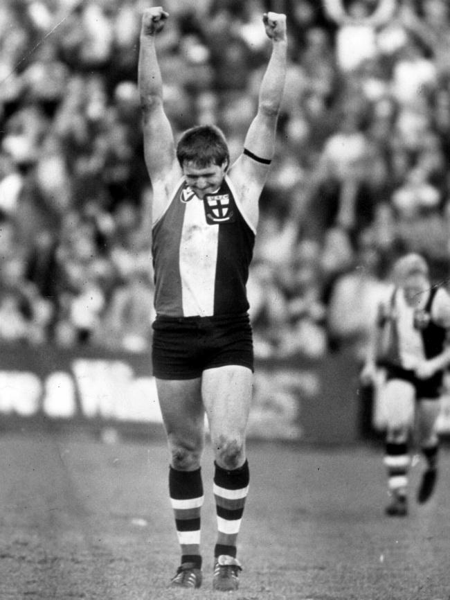 August and Tony Lockett celebrates his 100th goal. Plugger kicked 8.2 as the Saints beat Footscray by three points.