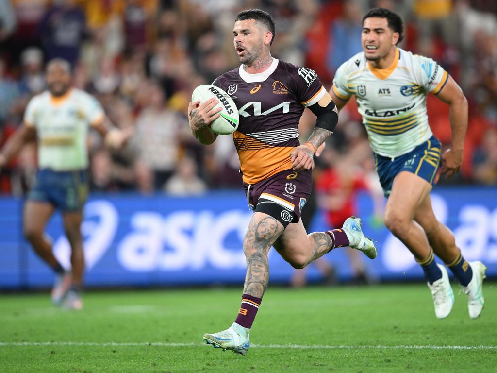 BRISBANE, AUSTRALIA - AUGUST 23: Adam Reynolds of the Broncos scores a try during the round 25 NRL match between Brisbane Broncos and Parramatta Eels at Suncorp Stadium, on August 23, 2024, in Brisbane, Australia. (Photo by Matt Roberts/Getty Images)