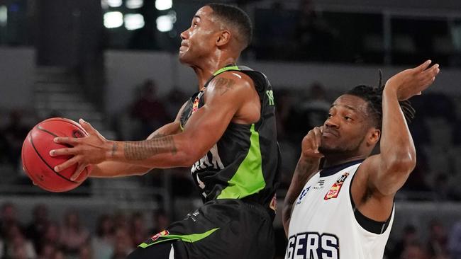 Keith Benson of the Phoenix attacks the basket against the Adelaide 36ers.