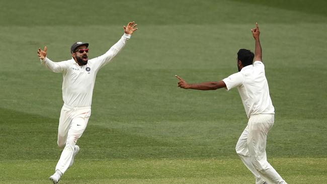 Ashwin celebrates with his skipper after taking the winning wicket. Picture: Getty