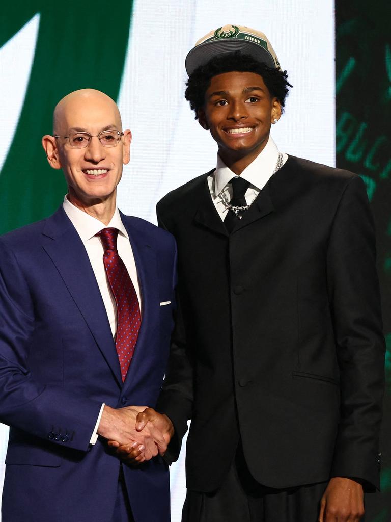 ...to shaking hands with the NBA commissioner on draft day. Picture: Getty Images/AFP