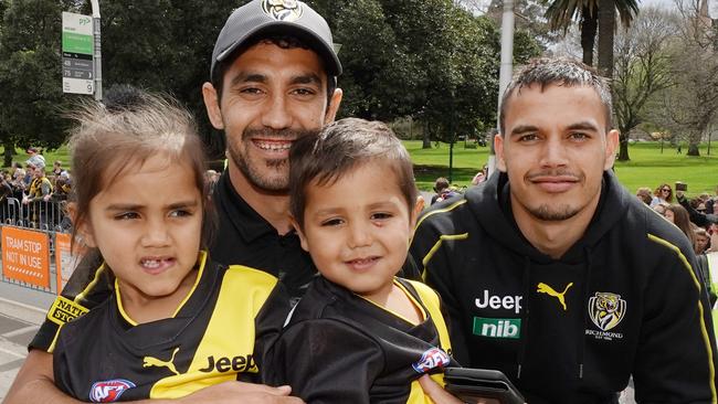 Marlion Pickett is seen with his kids during the AFL Grand Final Parade. Picture: AAP